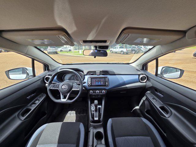 Photo of 2025 Aspen White Pearl Nissan Versa