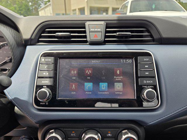 Photo of 2025 Aspen White Pearl Nissan Versa
