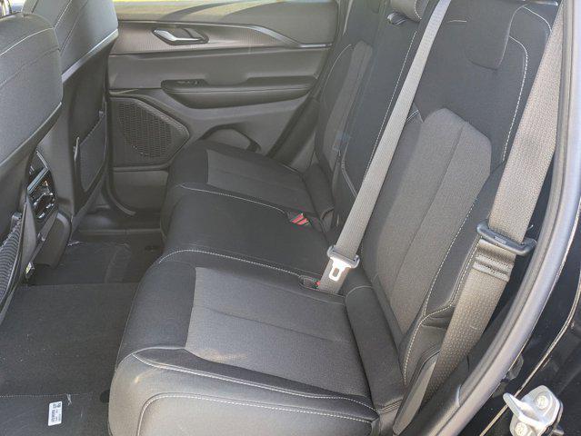 Photo of 2025 Diamond Black Crystal Pearlcoat Jeep Grand Cherokee