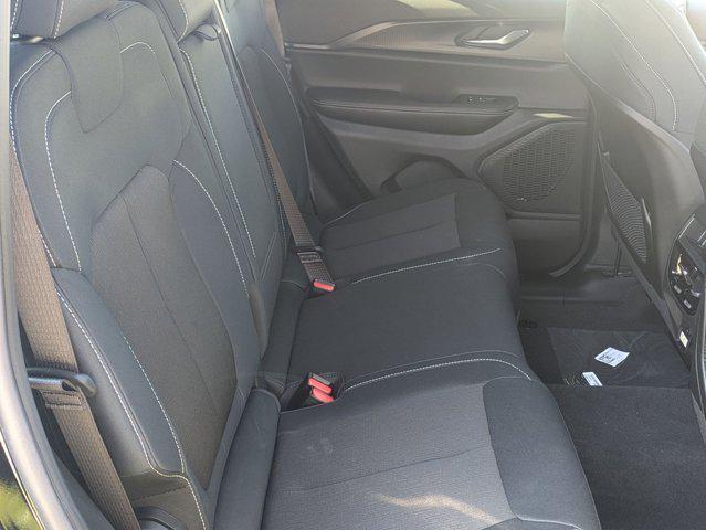 Photo of 2025 Diamond Black Crystal Pearlcoat Jeep Grand Cherokee