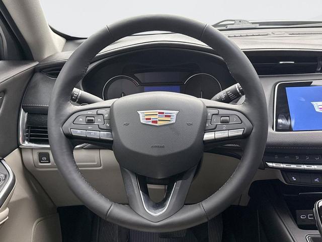 Photo of 2022 Crystal White Tricoat Cadillac XT4