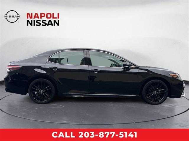Photo of 2023 Midnight Black Metallic Toyota Camry