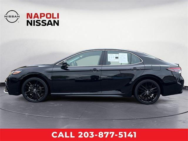 Photo of 2023 Midnight Black Metallic Toyota Camry