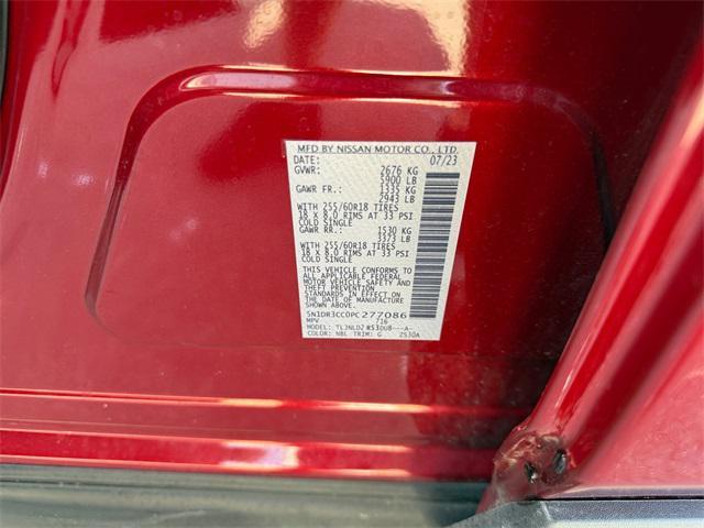 Photo of 2023 Scarlet Ember Tintcoat/Super Black Nissan Pathfinder