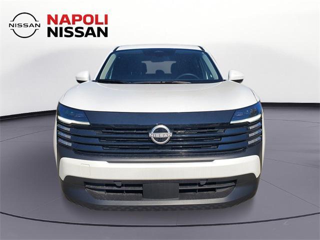 Photo of 2025 Aspen White Tricoat Nissan Kicks