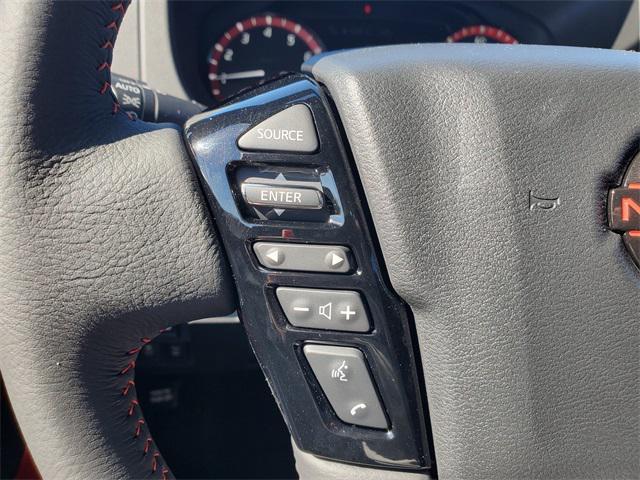Photo of 2025 Afterburn Orange Nissan Frontier