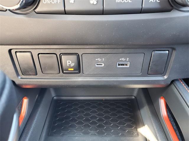 Photo of 2025 Afterburn Orange Nissan Frontier