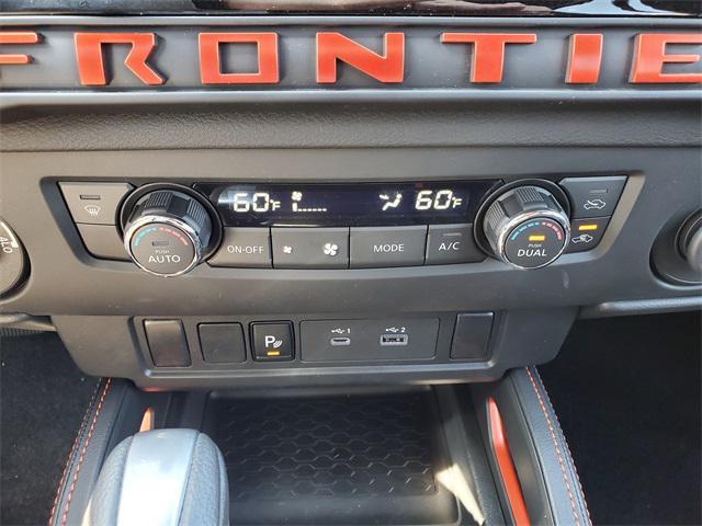 Photo of 2025 Afterburn Orange Nissan Frontier