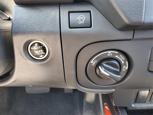 Photo of 2025 Afterburn Orange Nissan Frontier