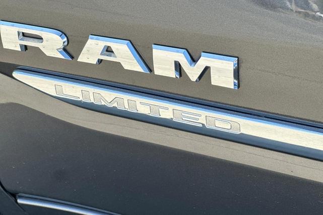 Photo of 2023 Granite Crystal Clearcoat Metallic RAM 1500