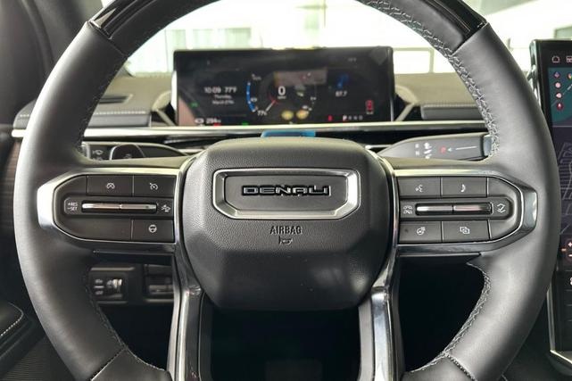 Photo of 2025 Summit White GMC Sierra EV