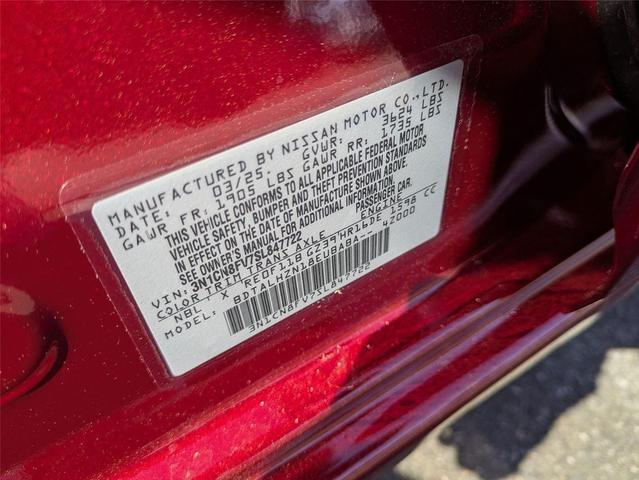 Photo of 2025 Scarlet Ember Tintcoat Nissan Versa