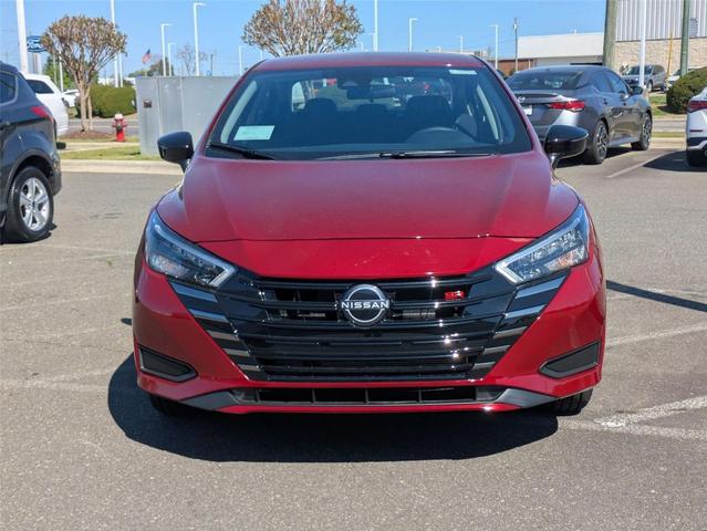 Photo of 2025 Scarlet Ember Tintcoat Nissan Versa