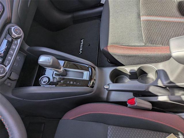 Photo of 2025 Scarlet Ember Tintcoat Nissan Versa