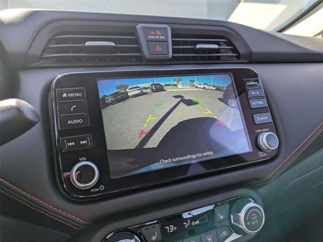 Photo of 2025 Scarlet Ember Tintcoat Nissan Versa