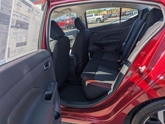 Photo of 2025 Scarlet Ember Tintcoat Nissan Versa