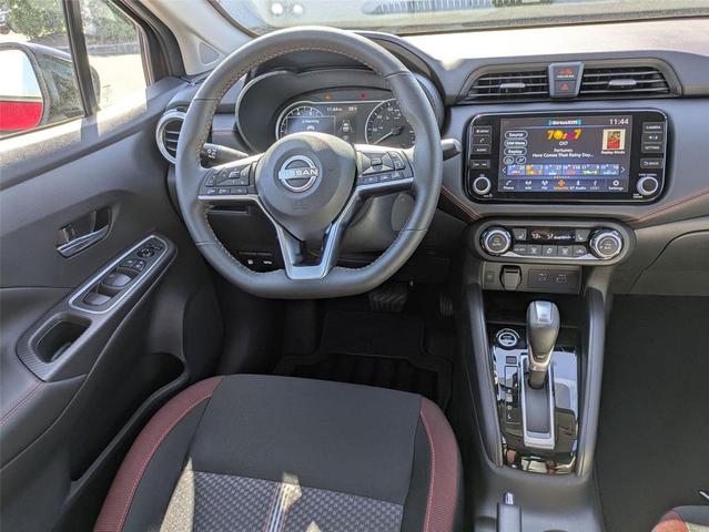 Photo of 2025 Scarlet Ember Tintcoat Nissan Versa