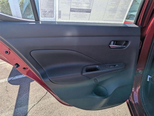 Photo of 2025 Scarlet Ember Tintcoat Nissan Versa