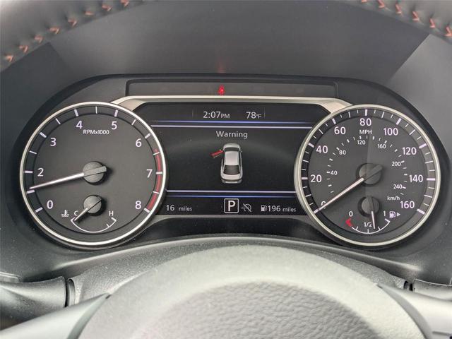 Photo of 2025 Aspen White Tricoat/Super Black Nissan Sentra