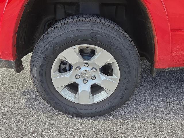 Photo of 2025 Flame Red Clearcoat RAM 1500