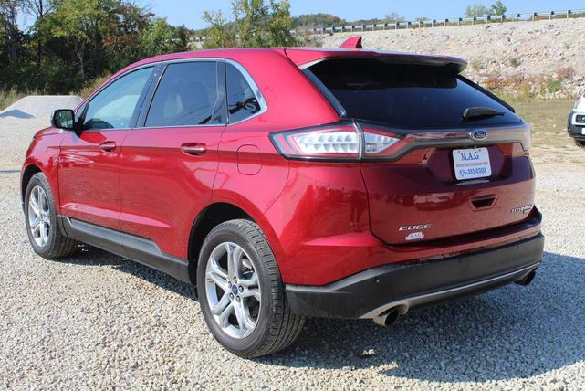Photo of 2016 Ruby Red Metallic Tinted Clearcoat Ford Edge