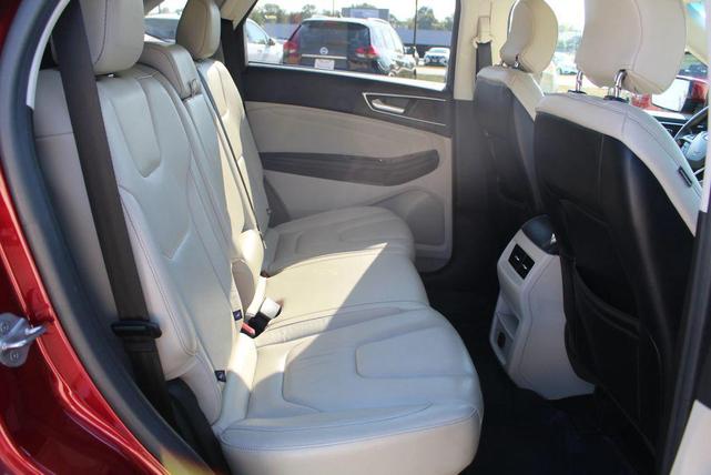 Photo of 2016 Ruby Red Metallic Tinted Clearcoat Ford Edge
