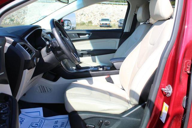 Photo of 2016 Ruby Red Metallic Tinted Clearcoat Ford Edge