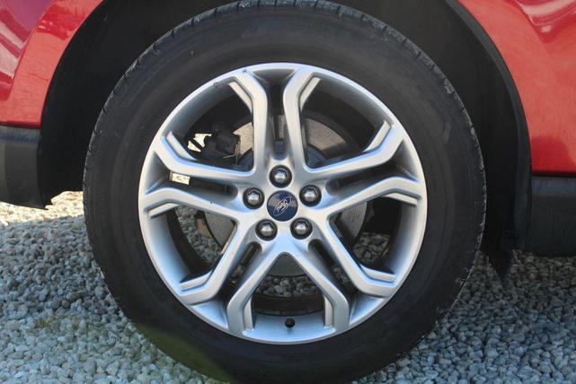Photo of 2016 Ruby Red Metallic Tinted Clearcoat Ford Edge