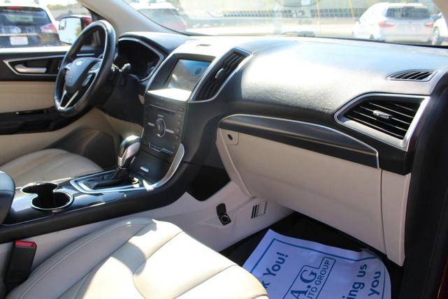 Photo of 2016 Ruby Red Metallic Tinted Clearcoat Ford Edge