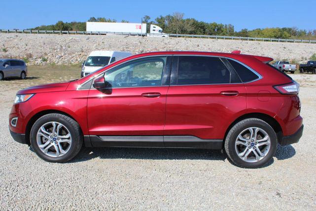Photo of 2016 Ruby Red Metallic Tinted Clearcoat Ford Edge