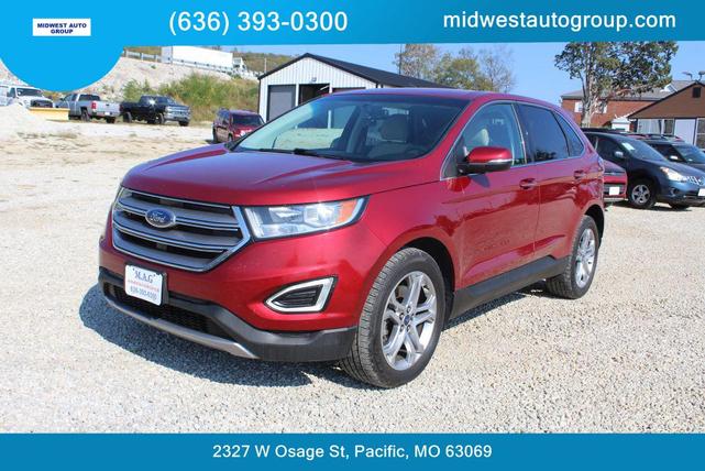 Photo of 2016 Ruby Red Metallic Tinted Clearcoat Ford Edge