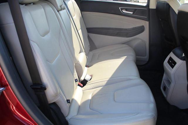 Photo of 2016 Ruby Red Metallic Tinted Clearcoat Ford Edge