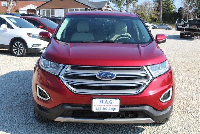 Photo of 2016 Ruby Red Metallic Tinted Clearcoat Ford Edge