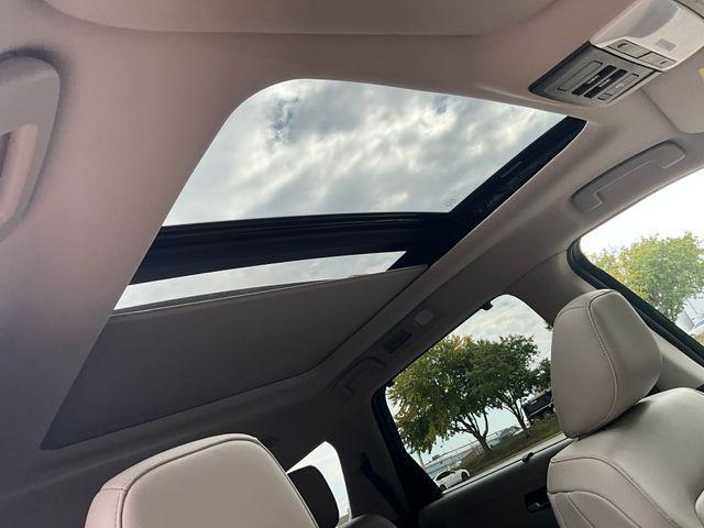Photo of 2025 Obsidian Green Pearl Nissan Pathfinder
