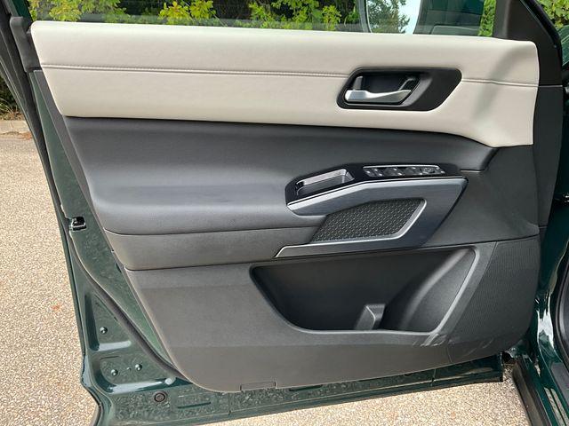 Photo of 2025 Obsidian Green Pearl Nissan Pathfinder