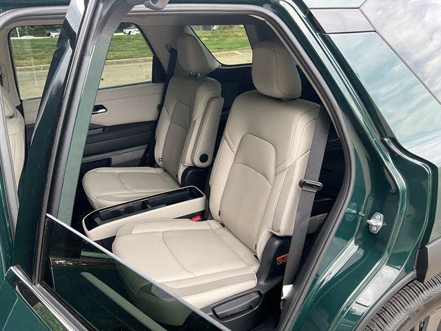 Photo of 2025 Obsidian Green Pearl Nissan Pathfinder