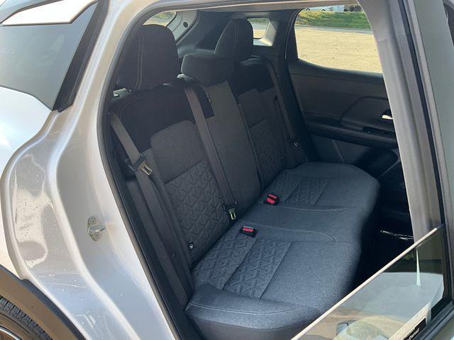 Photo of 2025 Aspen White Tricoat/Super Black Nissan Kicks