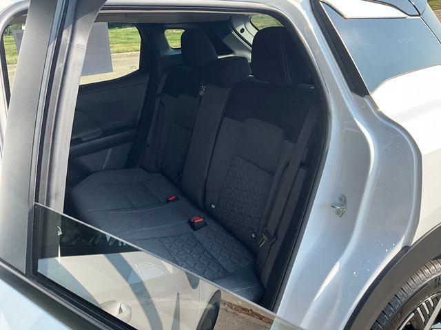 Photo of 2025 Aspen White Tricoat/Super Black Nissan Kicks