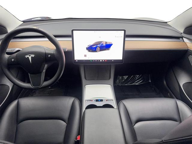 Photo of 2023 Deep Blue Metallic Tesla Model 3