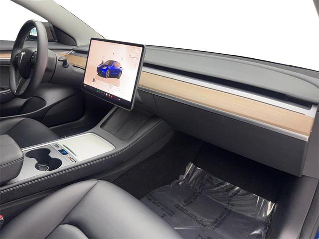 Photo of 2023 Deep Blue Metallic Tesla Model 3
