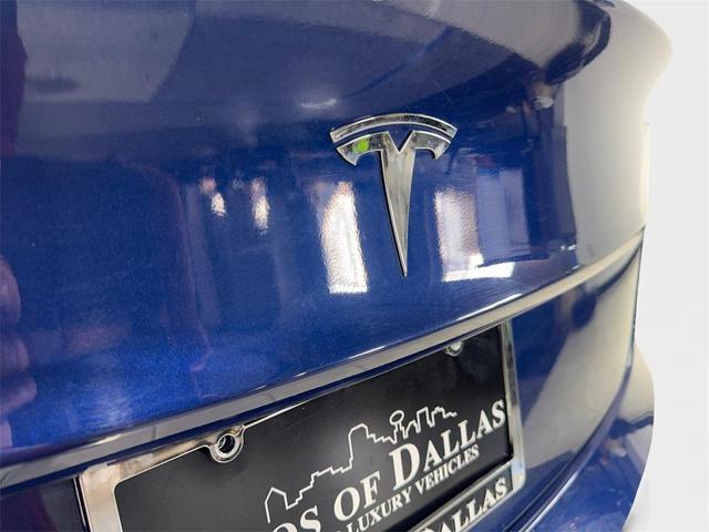 Photo of 2023 Deep Blue Metallic Tesla Model 3