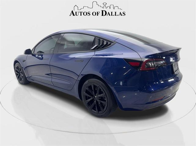 Photo of 2023 Deep Blue Metallic Tesla Model 3