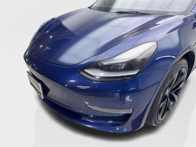 Photo of 2023 Deep Blue Metallic Tesla Model 3