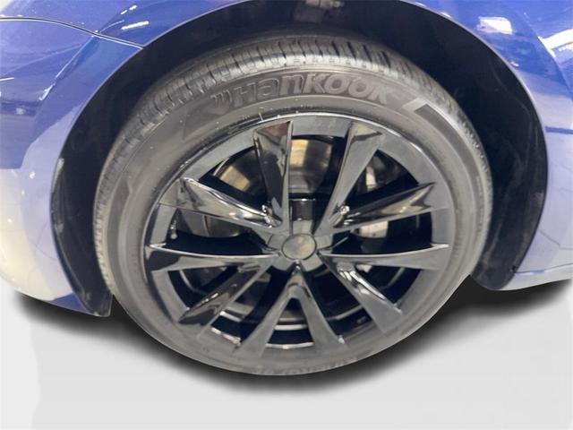 Photo of 2023 Deep Blue Metallic Tesla Model 3