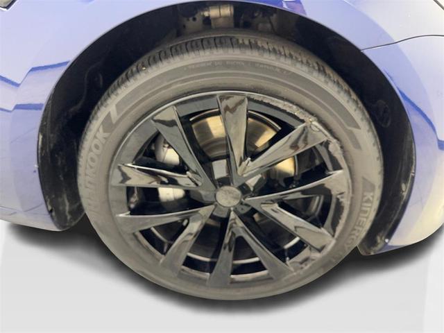 Photo of 2023 Deep Blue Metallic Tesla Model 3