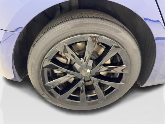 Photo of 2023 Deep Blue Metallic Tesla Model 3
