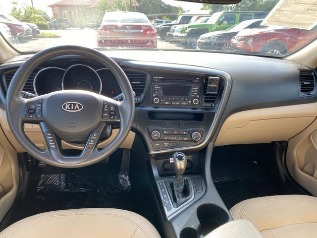 Photo of 2011 Dark Cherry Kia Optima