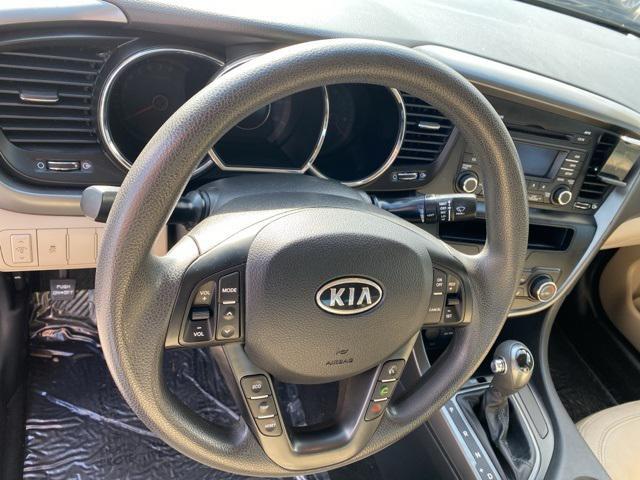 Photo of 2011 Dark Cherry Kia Optima