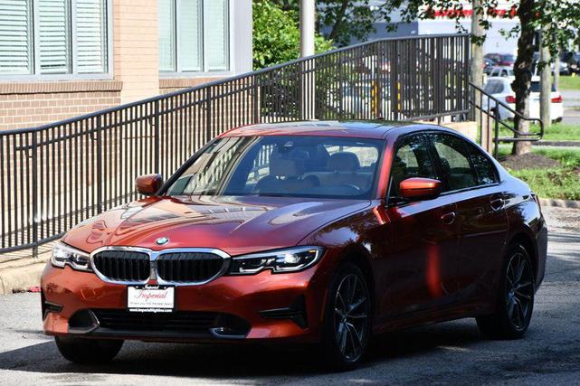 Photo of 2022 Sunset Orange Metallic BMW 330
