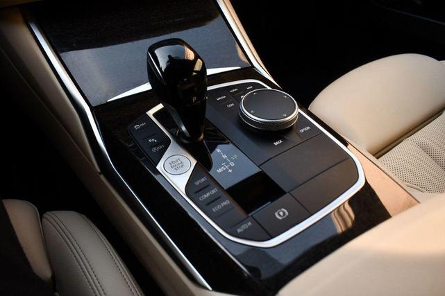 Photo of 2022 Sunset Orange Metallic BMW 330